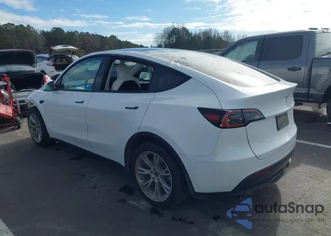 2023 Tesla Model Y Awd/Long Range Dual Motor All-Wheel Drive z USA, uszkodzony, nr VIN 7SAYGAEE4PF856425